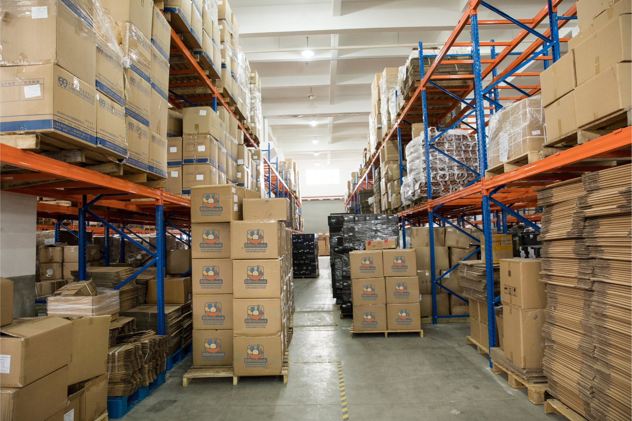 Warehouse with stacked korean snack boxes and a korean snack box to buy