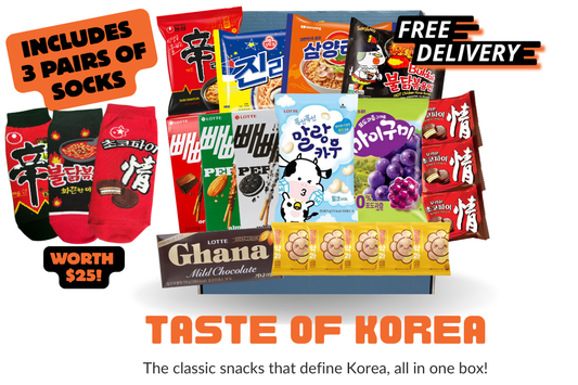 Assorted Korean snacks and socks including shin ramen, pepero and choco pie