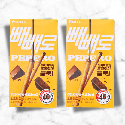 Korean treats and chocolate inside the Pepero Paradise snack box from BiBimSnack